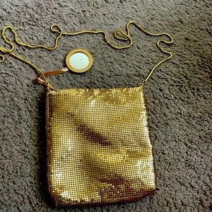 Cute sequence over the shoulder bag comes with a little mirror